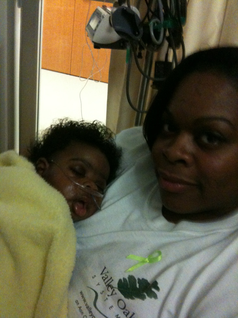 Mother discussing care with medical team